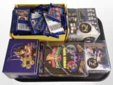 A group of trading cards : 24, Power Rangers, Legend of the Five Rings, etc.