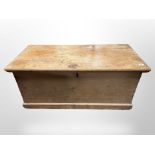 A Victorian pine blanket box with key,