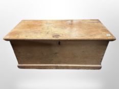 A Victorian pine blanket box with key,