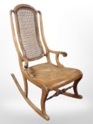 A bergere rocking chair