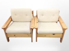 A pair of pine framed armchairs in oatmeal fabric,