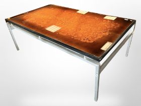 A 20th century Danish metal framed glass topped coffee table,