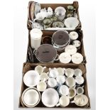 Three boxes of 20th-century ceramics, mugs, enameled sauce pans, kitchen storage jars, etc.