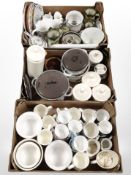 Three boxes of 20th-century ceramics, mugs, enameled sauce pans, kitchen storage jars, etc.