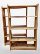A pair of pine open bookcases,