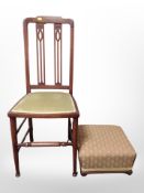 A reproduction mahogany chair and a footstool