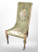 A 19th century beech framed Lady's salon chair in floral upholstery