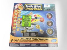 A Hasbro Angry Birds Star Wars Millennium Falcon bounce game.