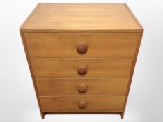 A Danish teak and MDF four drawer chest,