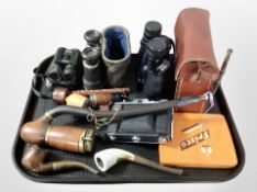 A group of antique and modern binoculars, pipes, Nettar camera, etc.