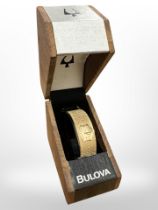 A lady's gold plated Bulova quartz wristwatch,
