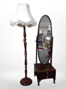 A Stag cheval mirror and reproduction standard lamp