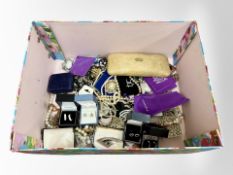 A box of assorted costume jewellery,