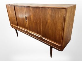 A Danish teak sliding door sideboard,