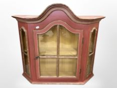 A Scandinavian painted and gilt pine wall cabinet,