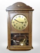 A Junghans oak cased wall clock,
