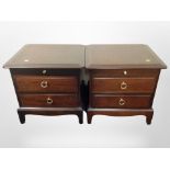 A pair of Stag three drawer bedside chests,