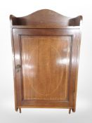 An Edwardian mahogany and satin wood banded wall cabinet,