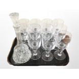 A set of 11 Scandinavian crystal drinking glasses and a mallet-shaped decanter.