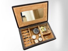A musical jewellery box containing silver and other dress rings,