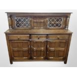 An Ercol stained elm buffet sideboard,