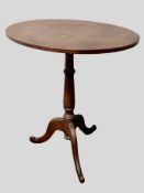 A pine tripod occasional table in scumbled finish,