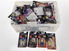 A box of Hasbro Transformers miniature figurines.