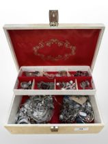A jewellery box of silver and costume jewellery, dress rings, necklaces, silver torque bangle,