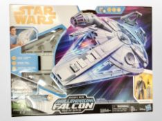 A Hasbro Star Wars Kessel Run Millennium Falcon, boxed.
