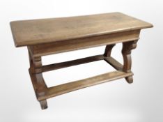 An early 20th century oak rectangular coffee table,