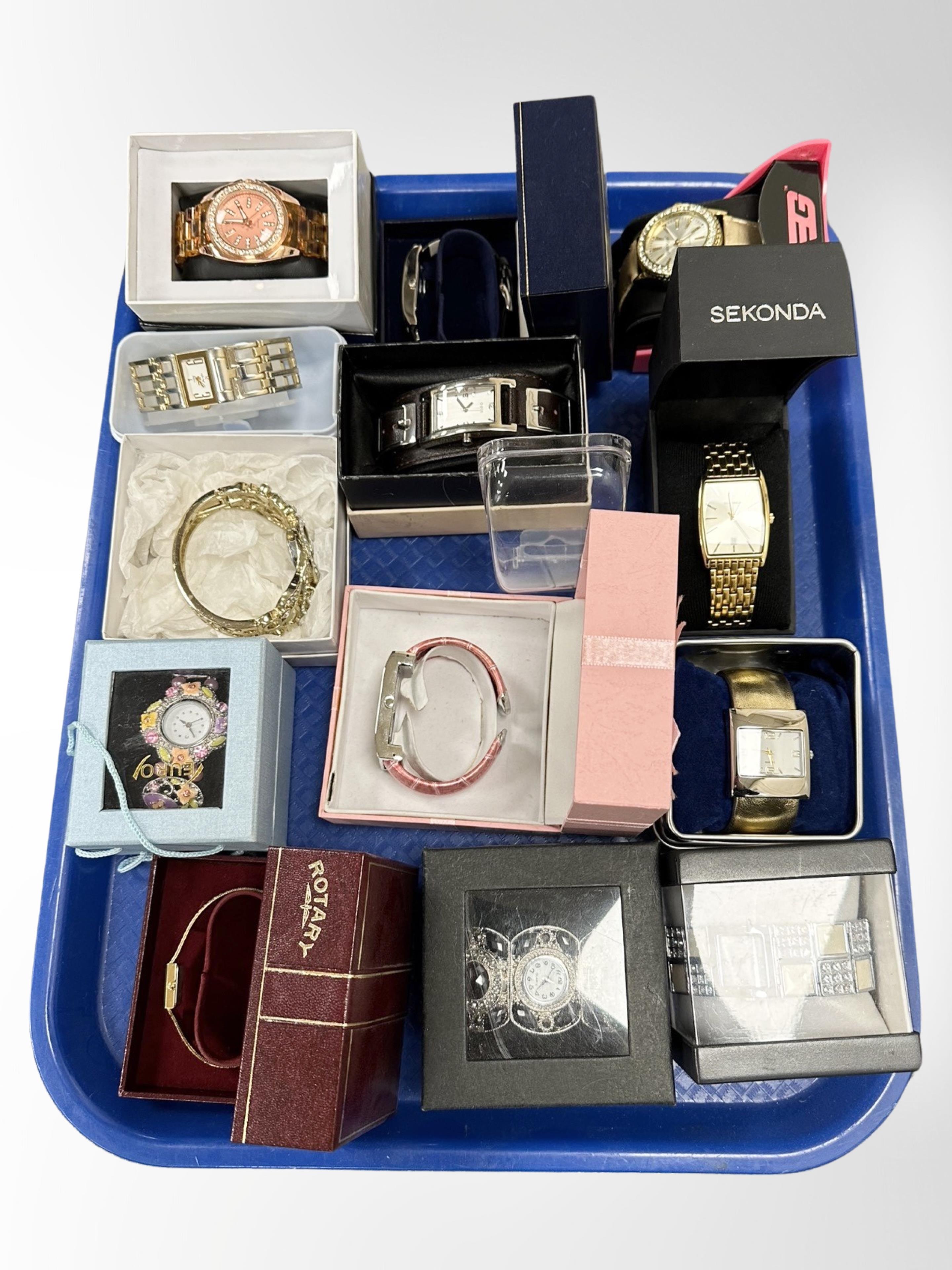 A collection of various wristwatches, in boxes.