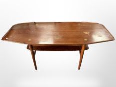 A 20th century Danish teak shaped coffee table,