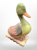 A carved and painted wood figure of a duck, height 51cm.
