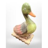 A carved and painted wood figure of a duck, height 51cm.