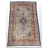 A Tabiz rug, Iranian Azerbaijan, 128cm x 76cm.