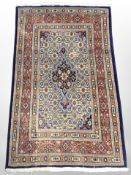 A Tabiz rug, Iranian Azerbaijan, 128cm x 76cm.