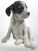 A Royal Copenhagen figure of a seated puppy, height 20cm.