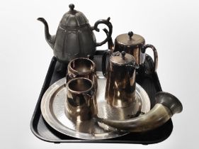 A stainless steel tea service and tray, together with a pewter teapot and a pewter-mounted horn.