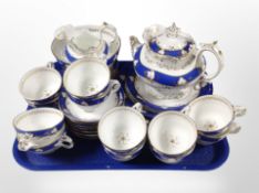 30 pieces of late Victorian blue and gilt porcelain tea china.