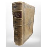 A Victorian leather-bound comprehensive family Bible containing monochrome engraved plates,