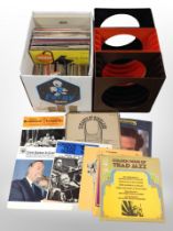 A box of vinyl LP records and 45 singles including jazz,