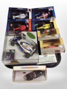 A group of boxed diecast cars including Formula-1, Hongwell, etc.