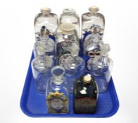 A group of Holmegaard and other glass apothecary bottles.