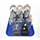 A group of Holmegaard and other glass apothecary bottles.