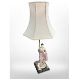 A continental figural table lamp with shade, overall height 71cm.