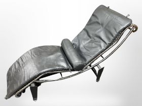 A late 20th-century chrome and black leather day bed on stand, length 164cm.