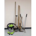 A Draper vacuum cleaner and a quantity of garden tools.