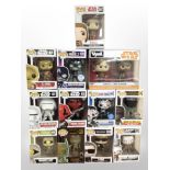 12 Funko figures, boxed.