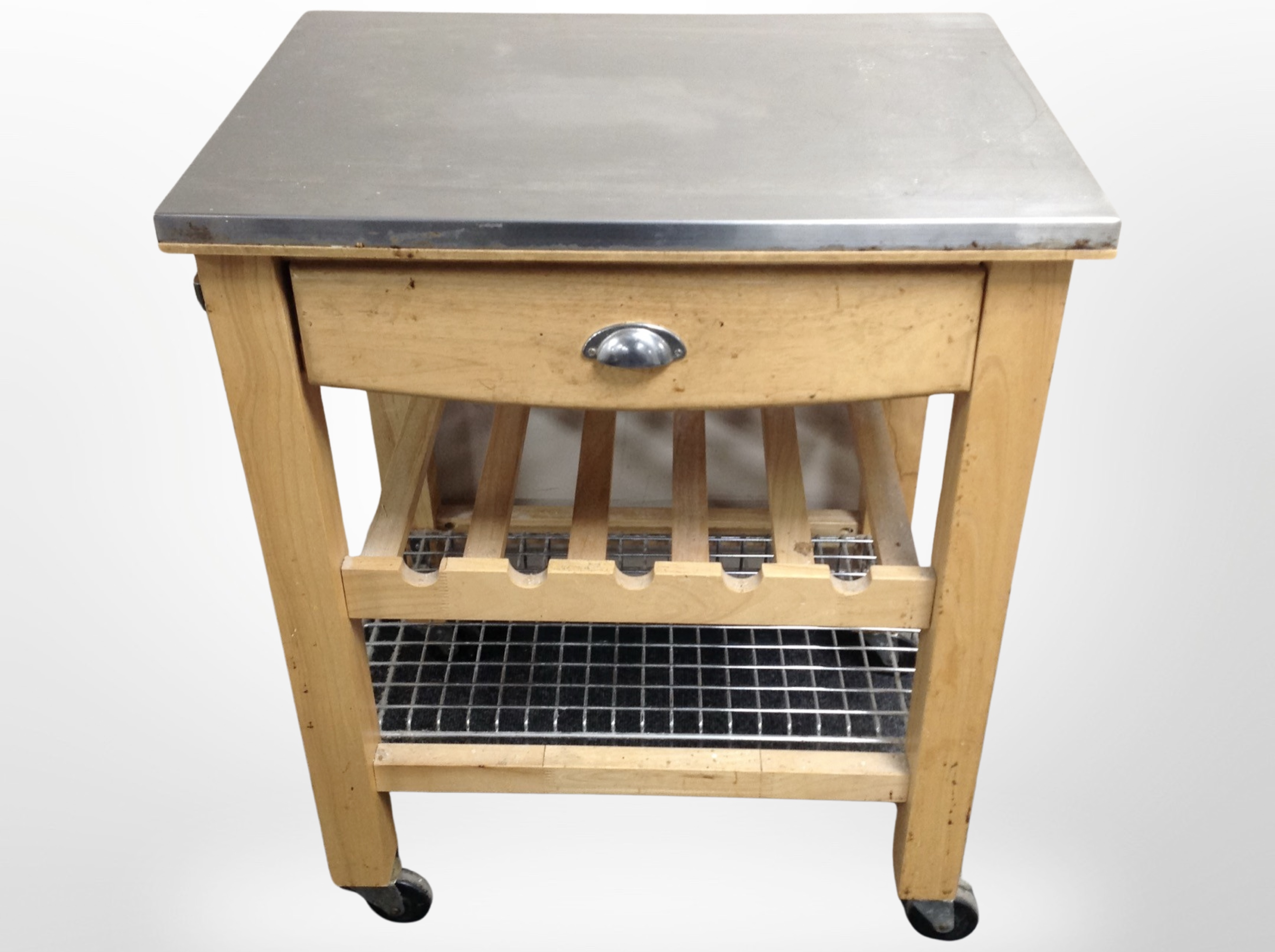 A stainless steel-topped pine kitchen trolley fitted a drawer, 70cm x wide x 50cm deep x 87cm high.