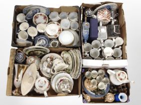 Four boxes containing assorted ceramics including blue and white willow pattern china,